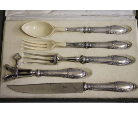 A FRENCH SILVER SERVING SET, maker's mark HB, early 20th century, with foliate stamped and filled handles comprising carving 