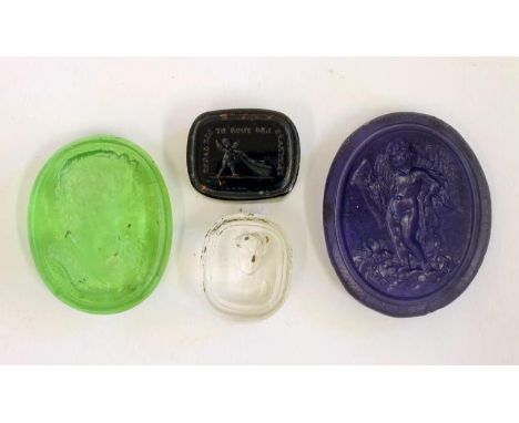 A COLLECTION OF FOUR TASSIE TYPE SEALS comprising an oval transparent green seal depicting a classical head portrait, a clear