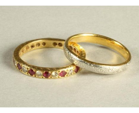 A PLATINUM AND 22CT GOLD BI-COLOUR WEDDING RING chased with scrolls, 3.4g gross, size N, together with a ruby and diamond ete