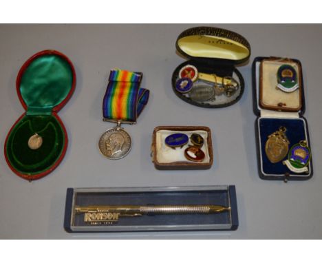 A mixed lot of enamel badges including silver examples together with a 1914-1918 medal to "G. A. Woodward V.A.D" and a boxed 