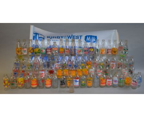 A large quantity of vintage Milk bottles, mostly advertising examples ranging from 1950s to 1980s. Together with a K&W Dairie