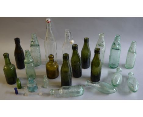 23 vintage glass bottles, mostly by local Black Country/ West Midland manufacturers.