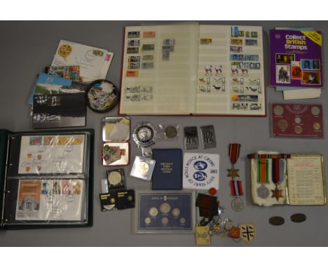 A good mixed lot of collectables including a WW2 medal group including a Burma Star and transmiting slip, stamp albums includ