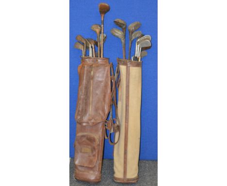 23 assorted vintage golf clubs. Contained in two vintage bags.