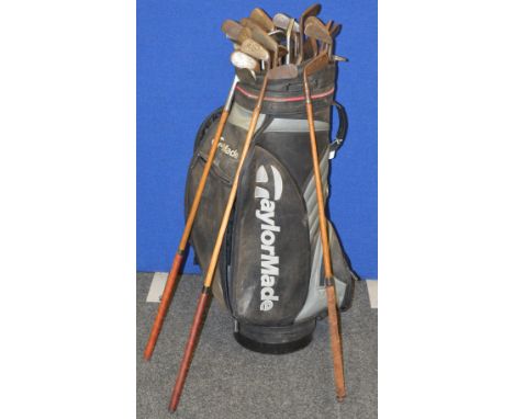 33 Vintage hickory golf clubs. Various assortment of irons and putters, makers include R Condie Hagen maxwell Gibson, Forgan 