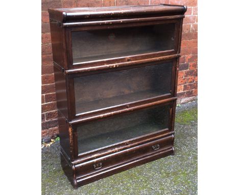 A Globe-Wernicke oak 3-tier stacking bookcase.