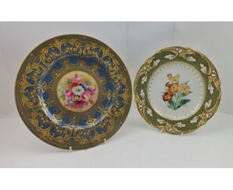 A ROYAL WORCESTER CERAMIC PLATE, blue border richly gilded, central hand painted panel of flowers, signed E. Phillips, 27cm d
