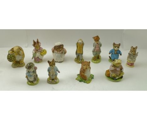 A COLLECTION OF ELEVEN BESWICK BEATRIX POTTER CERAMIC FIGURINES, includes eight with factory gold back stamps, amongst these 