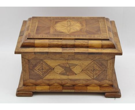 A 19TH CENTURY PARQUETRY TABLE CASKET, having hinged lid, fabric lined interior, on bracket feet, 23cm wide 