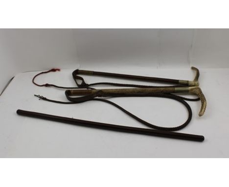 TWO HORN HANDLED HUNTING WHIPS, each with plaited shaft and thong, nickel mounted collars, one dated 9-9-29, together with a 