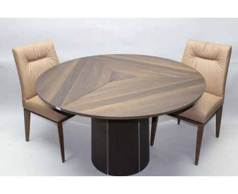 A CONTEMPORARY DANISH DESIGNER DINING SUITE comprising; a set of six "Calligaris" upholstered dining chairs on squared taperi