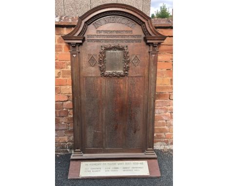 FIRST WORLD WAR COMMEMORATIVE OAK PANEL of arched form with pilasters framing the names of the fallen, overall height 1.75m w