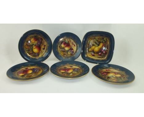 A ROYAL WORCESTER PORCELAIN PART DESSERT SERVICE, having gilded blue borders each with a painted panel of fruit, signed by H.