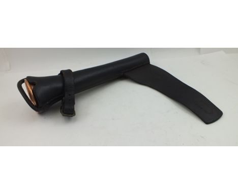 A COPPER HUNTING HORN in leather saddle case 