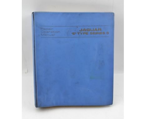 A JAGUAR 'E' TYPE SERIES 3, REPAIR OPERATION MANUAL, E.165 issue 1, loose leaf sheets in a blue plastic binder format and oth