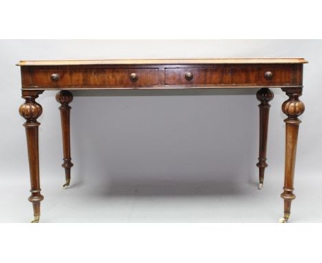 A 19TH CENTURY MAHOGANY WRITING TABLE, having rectangular top with skiver insert, over two inline slender drawers, supported 