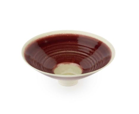Peter Wills (b.1955)Footed bowlporcelain, with flared rim and red glaze with a light green rimsigned and with impressed potte