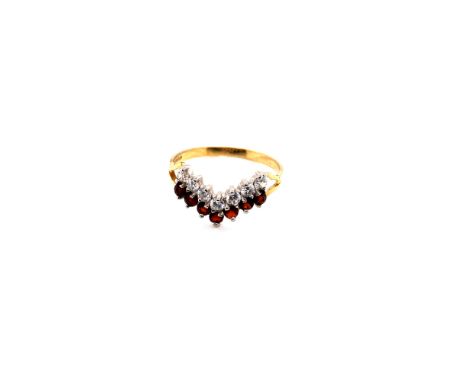 A 9ct HALLMARKED GOLD GARNET AND CZ TWO ROW WISHBONE ETERNITY STYLE RING. FINGER SIZE O 1/2. WEIGHT 1.64grms. 