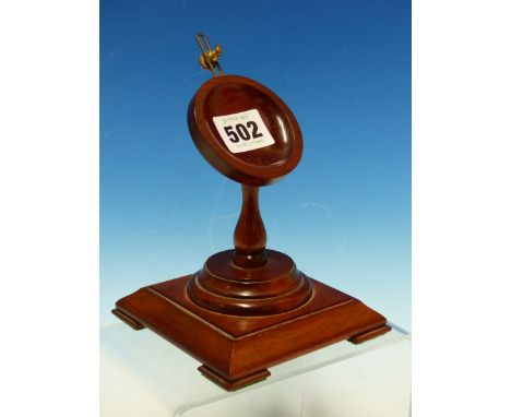 A SMALL MAHOHANY DESK TOP POCKET WATCH STAND.