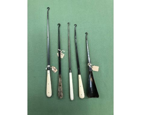 FIVE VARIOUS LARGE ANTIQUE BUTTON HOOKS WITH BONE IVORY AND ANTLER HANDLES.