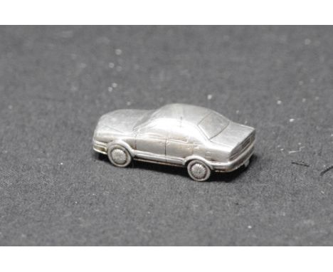 A Tiffany & Co. silver model of a Mitsubishi SIGMA car, London, 1991.