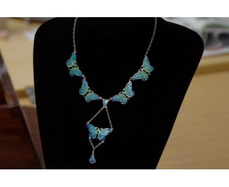 An unusual silver and enamel butterfly pendant necklace. Stamped Sterling.
