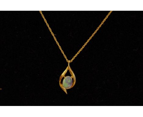 A 9ct gold pendant necklace, with an opal set pendant.