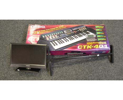A Casio 100 SongBank keyboard; a Finlux television (2)