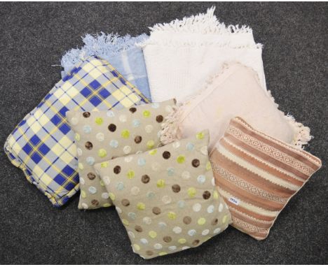 Textiles - a large double bed cream throw; another, in blue; cushions; etc.