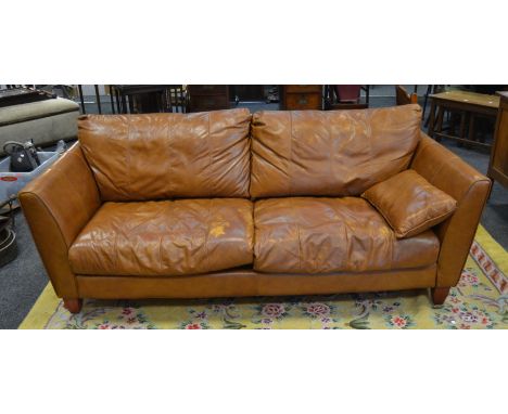 A large contemporary John Lewis tan leather sofa