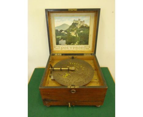 Polyphone, a mahogany boxed late 19c Polyphone, with lithograph picture in lid, working order with decorative inlaid top, box
