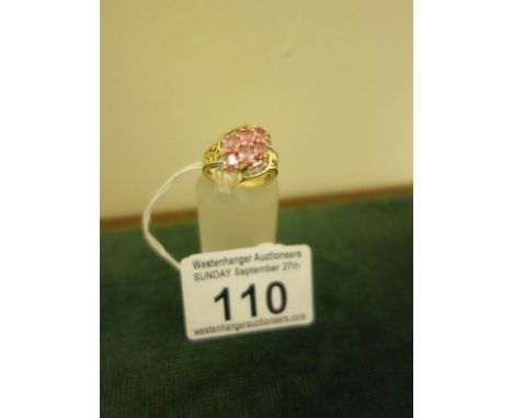 Ladies pink Sapphire and Tanzanite Cocktail ring, size L, large cluster of pink stones and small diamond chips to the top