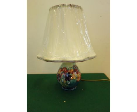 Moorcroft, a leaves and berries floral Pansy patterned table lamp with original William Moorcroft PLC shade, the shade model 