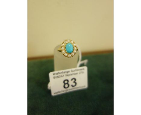 Ladies delicate turquoise and seed pearl 9ct gold ring size K, an oval turquoise surrounded by seed pearls on a 9ct gold shan