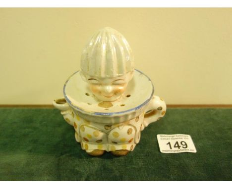 Novelty Lemon squeezer Art Deco period, 5" tall modeled as a smiling Chinese Man a 2 item piece the head removes to reveal th