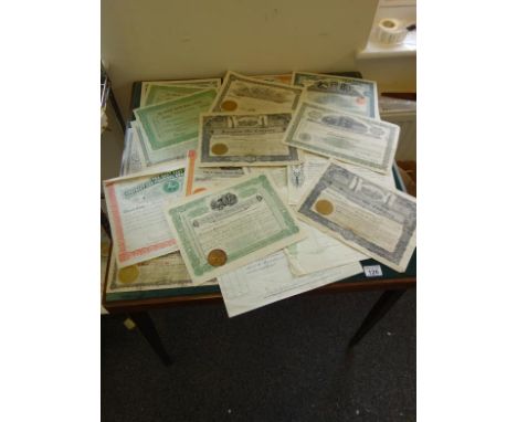 Share certificates, oil and mining, many with colourful illustrations including the East Kent Company, an amount of odd share