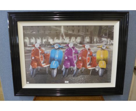 A Vespa scooters print, framed 