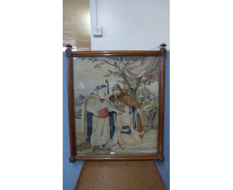 A large Victorian woolwork tapestry, religious scene, framed 