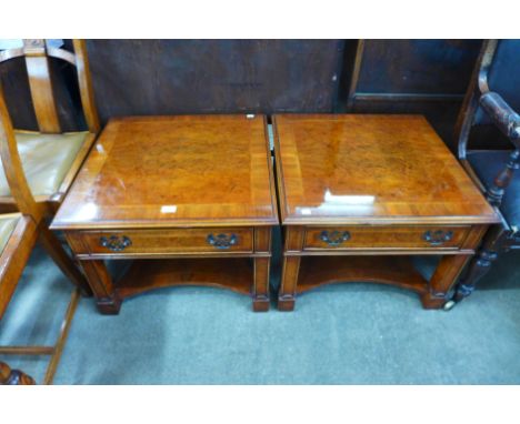 A pair of George III style burr walnut single drawer lamp tables 