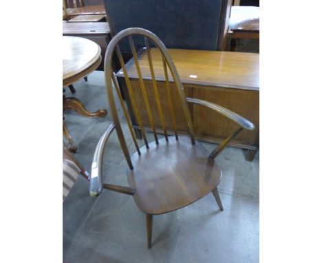 An Ercol Golden Dawn elm and beech Quaker elbow chair 