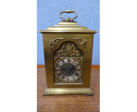 A small brass bracket clock 