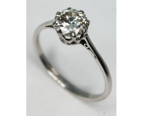 A diamond solitaire ring, the round cut diamond approx. 0.96 carats, band marked 'PLAT', gross wt. 2.5g, size P.  Condition -