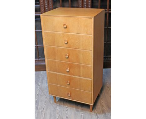 A Meredew retro light oak narrow chest of drawers, width 61cm, depth 46cm &amp; height 124cm.  