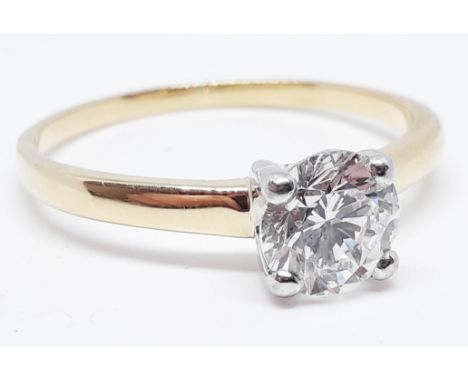 A diamond solitaire ring, the round brilliant cut 1.74 carat diamond in four claw setting, band hallmarked 18ct gold, gross w