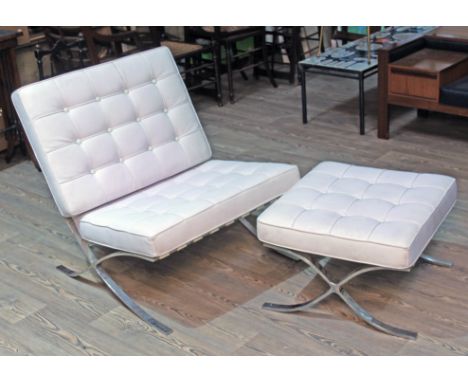 A cream leather and polished steel Barcelona chair and matching stool after the original design by Ludwig Mies Van De Rohe, l