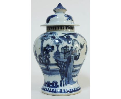 A Chinese Kangxi style blue and white porcelain vase and cover, bearing four character mark and double ring to base, height 2