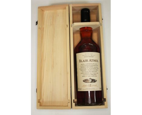 Blair Athol aged 12 years  single malt scotch whisky 43% 70cl with wooden case, level high shoulder.  