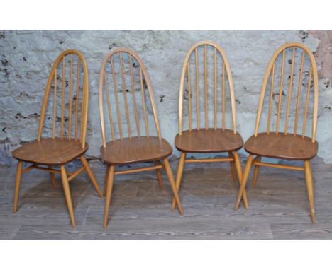 A set of four Ercol blonde elm and beech spindle back chairs.  