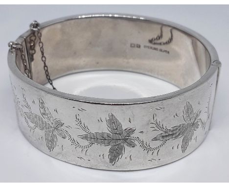 A hallmarked silver bangle, diam. approx. 67mm, wt. 32.7g.  