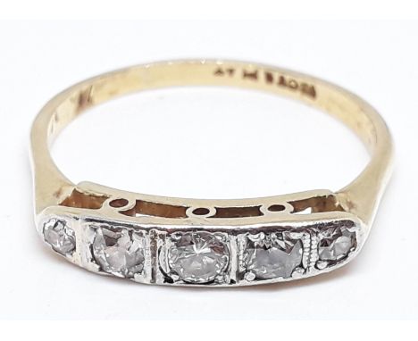 An 18ct gold five stone diamond ring, marked '18ct &amp; PLAT', gross wt. 2.3g, size O.  